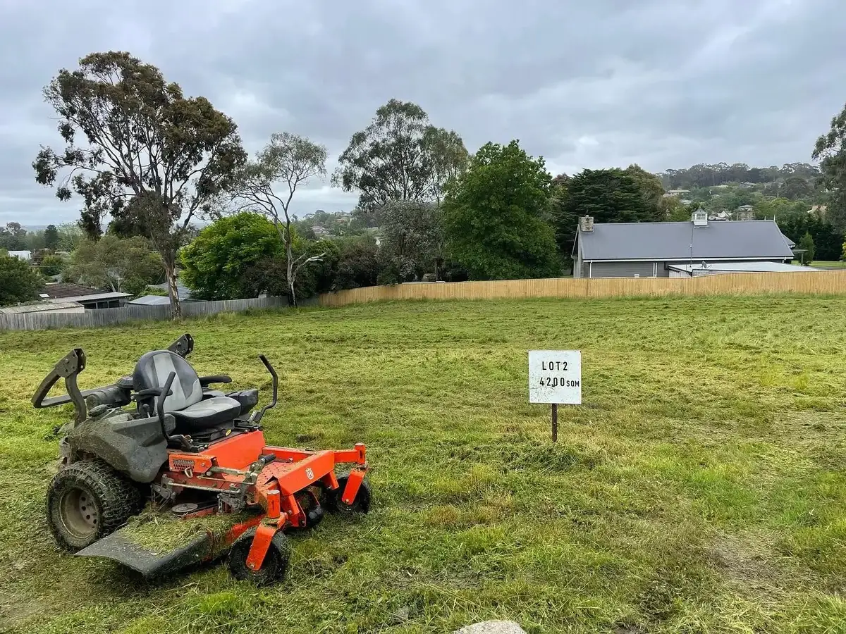 Zero-turn mower slashing a vacant residential block in South-East Melbourne