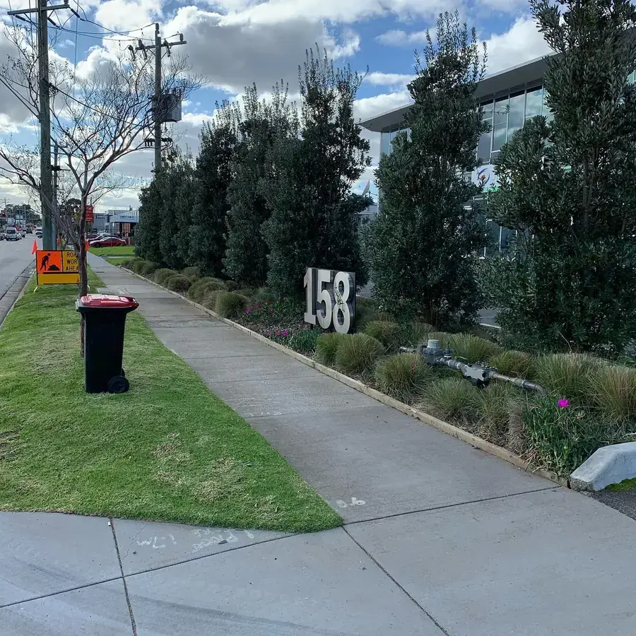 Blue Hills crew carrying out body corporate grounds maintenance on a Pakenham estate